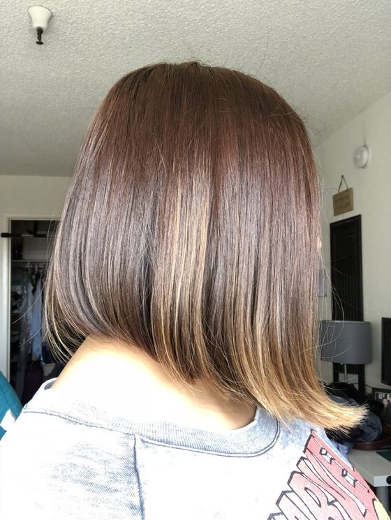 A shoulder-length cut finished with a smooth blow dry.
